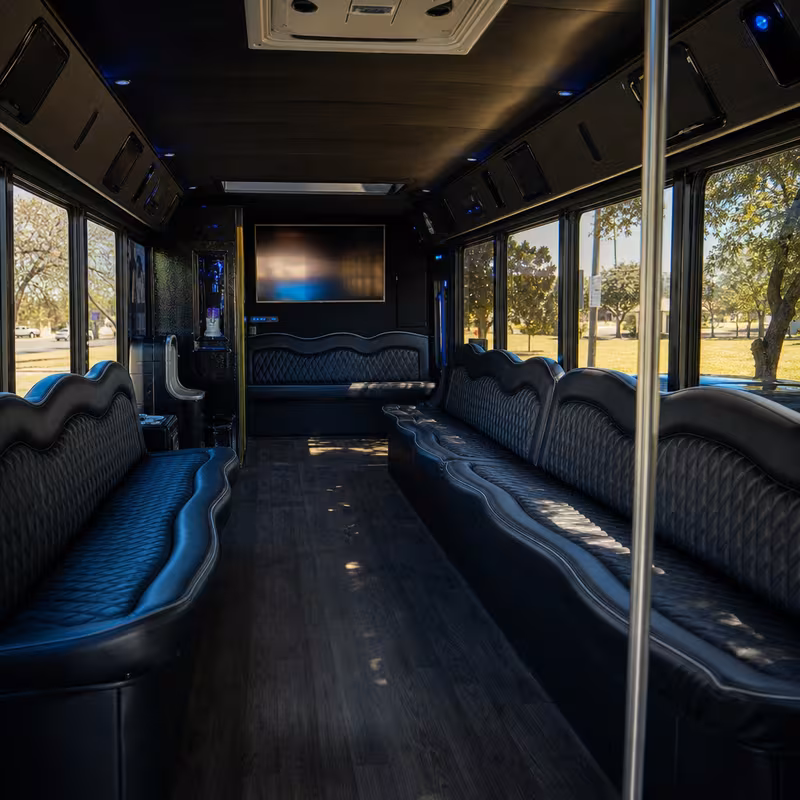 Friends laughing during an Oklahoma City party bus celebration
