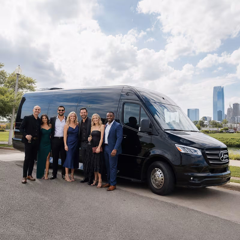 Group beside a Mercedes Sprinter limo from the Oklahoma City fleet