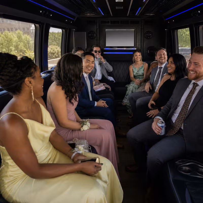 Wedding guests seated inside an Oklahoma City party bus