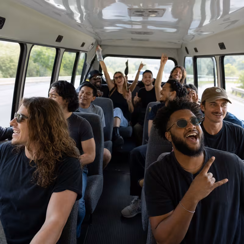 Party bus interior with wraparound leather seating and LED lighting in Oklahoma City