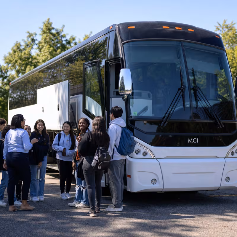 Black Mercedes Sprinter van staged for an Oklahoma City School Transportation group