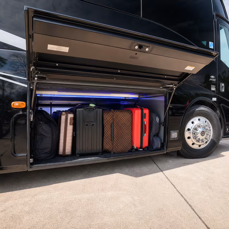 Party bus interior with wraparound leather seating and LED lighting in Oklahoma City