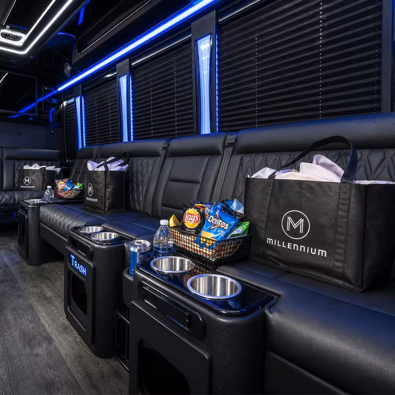 Party bus interior with wraparound leather seating and LED lighting in Oklahoma City